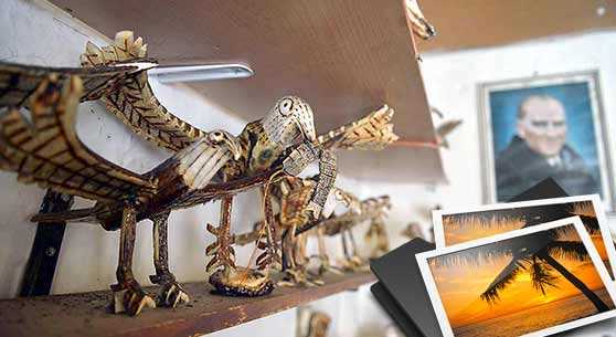 BOYNUZDAN HEYKELLER YAPIYOR