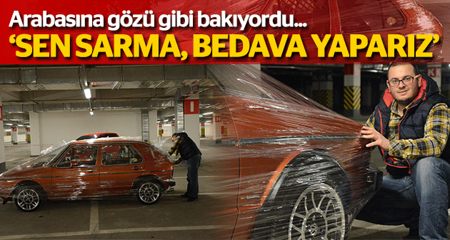 Aracını streç film ile sarıyor