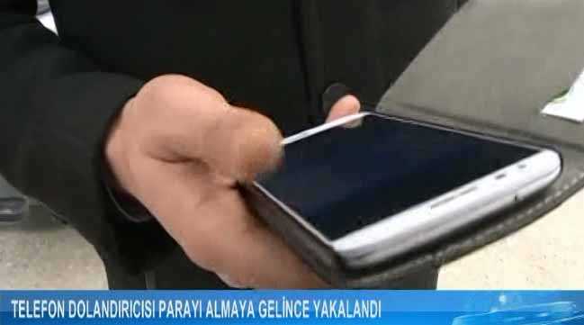 Dolandırıcı parayı alırken yakalandı