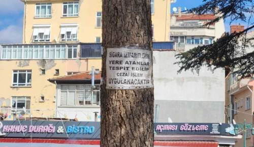 Eskişehir’de ağaca asılan uyarı tabelası dikkat çekti