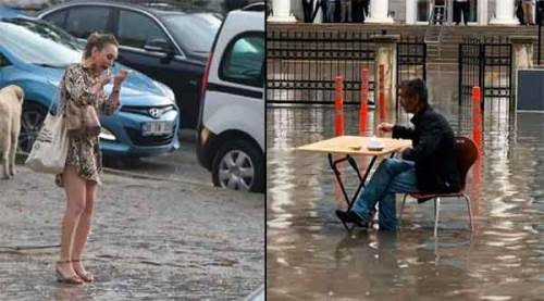 Eskişehir'de yağmurda makyaj yapan kadın ilgi çekti