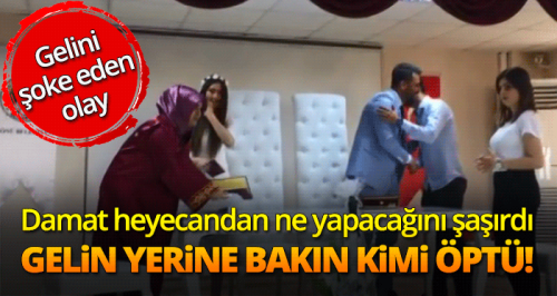Heyecandan gelini unuttu onu öptü!