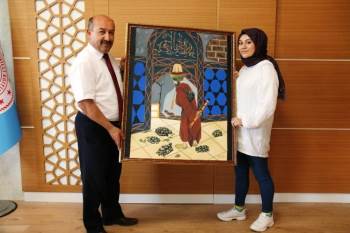 Kendi Çizdiği ‘Kaplumbağa Terbiyecisi’ Konulu Resmi Müdür Başyiğit’E Hediye Etti
