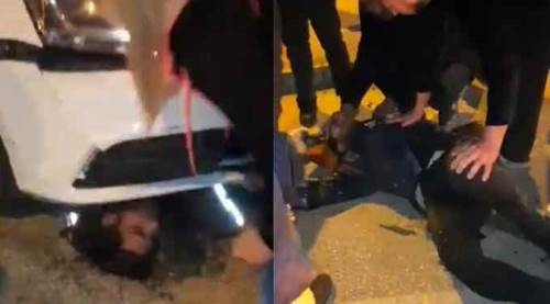 Korkunç görüntü: Otomobilin altında sıkıştı