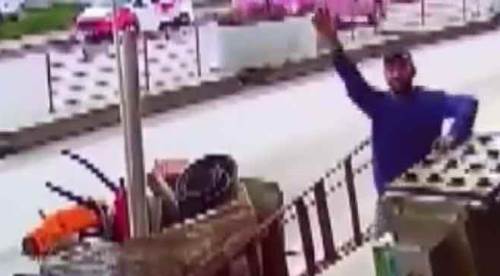 Pişkin hırsız kameraya el sallayınca...