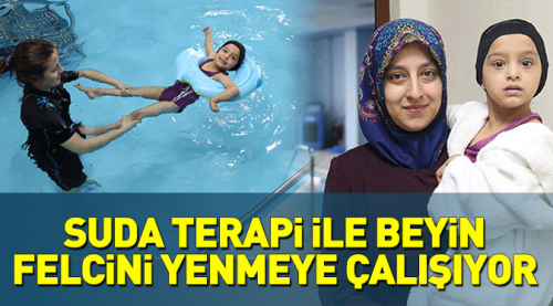 Suda terapi ile hastalığı yenmeye çalışıyor