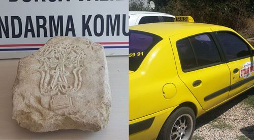 Tarihi mezar taşını satamadan yakalandılar